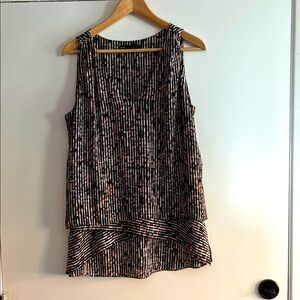 White House Black Market Sleeveless Woman’s Pattern Top
Black & Pink